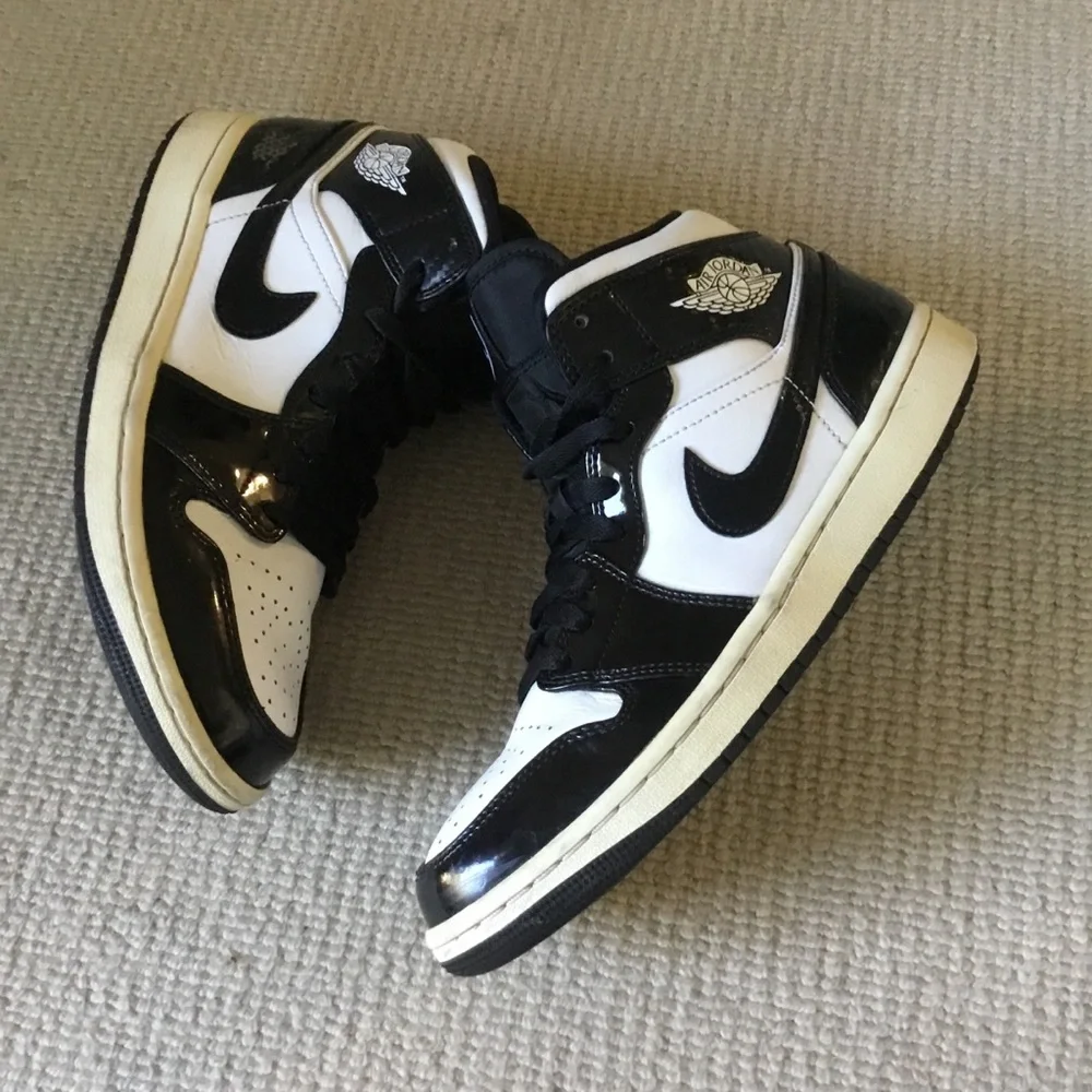 Jordan Black and White High-Top Sneakers